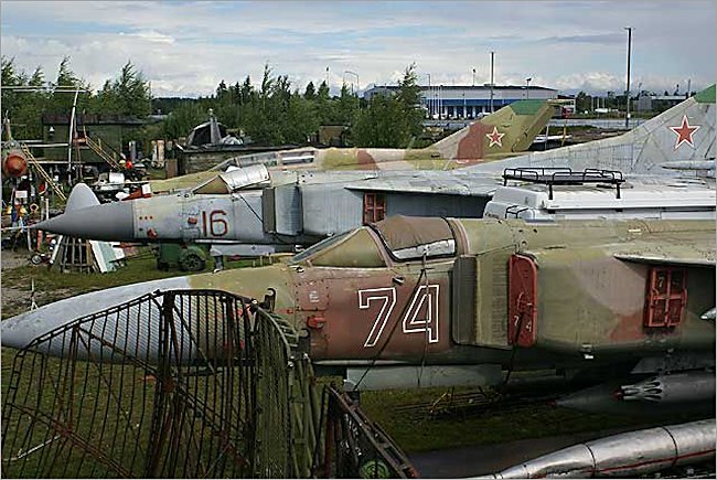 There are two Mikoyan-Gurevich MiG-23 Flogger jet fighter at Riga Airport in Latvia